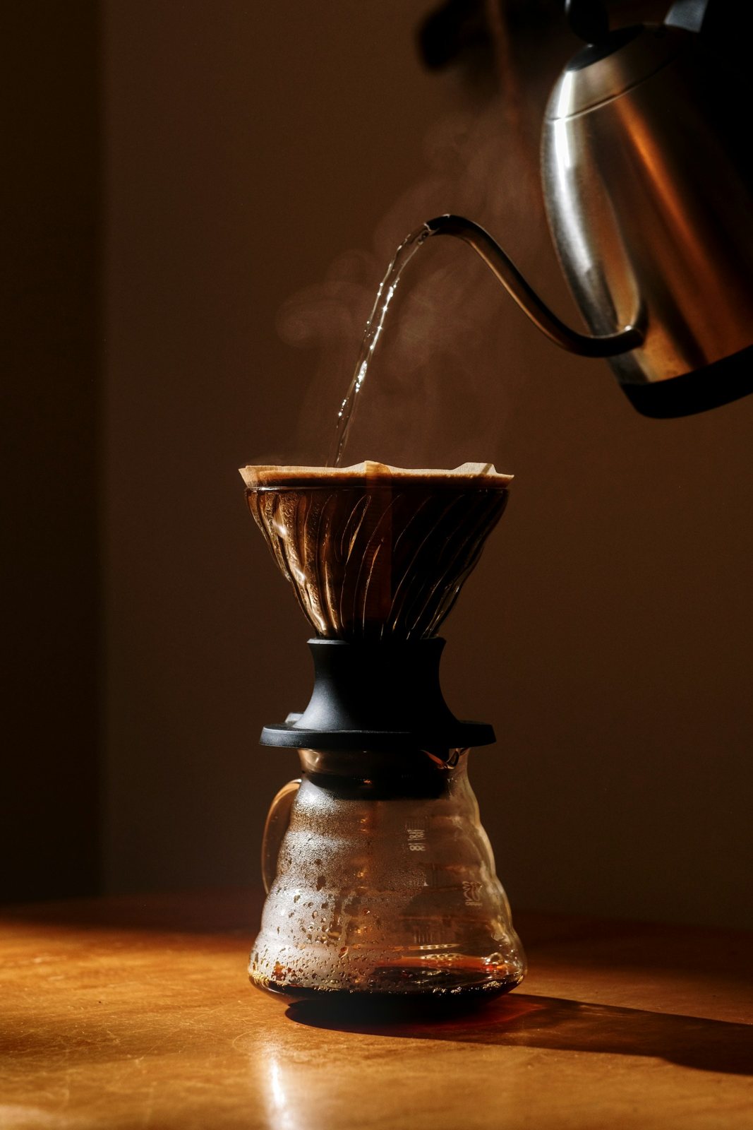 Hot water being poured over coffee in a filter